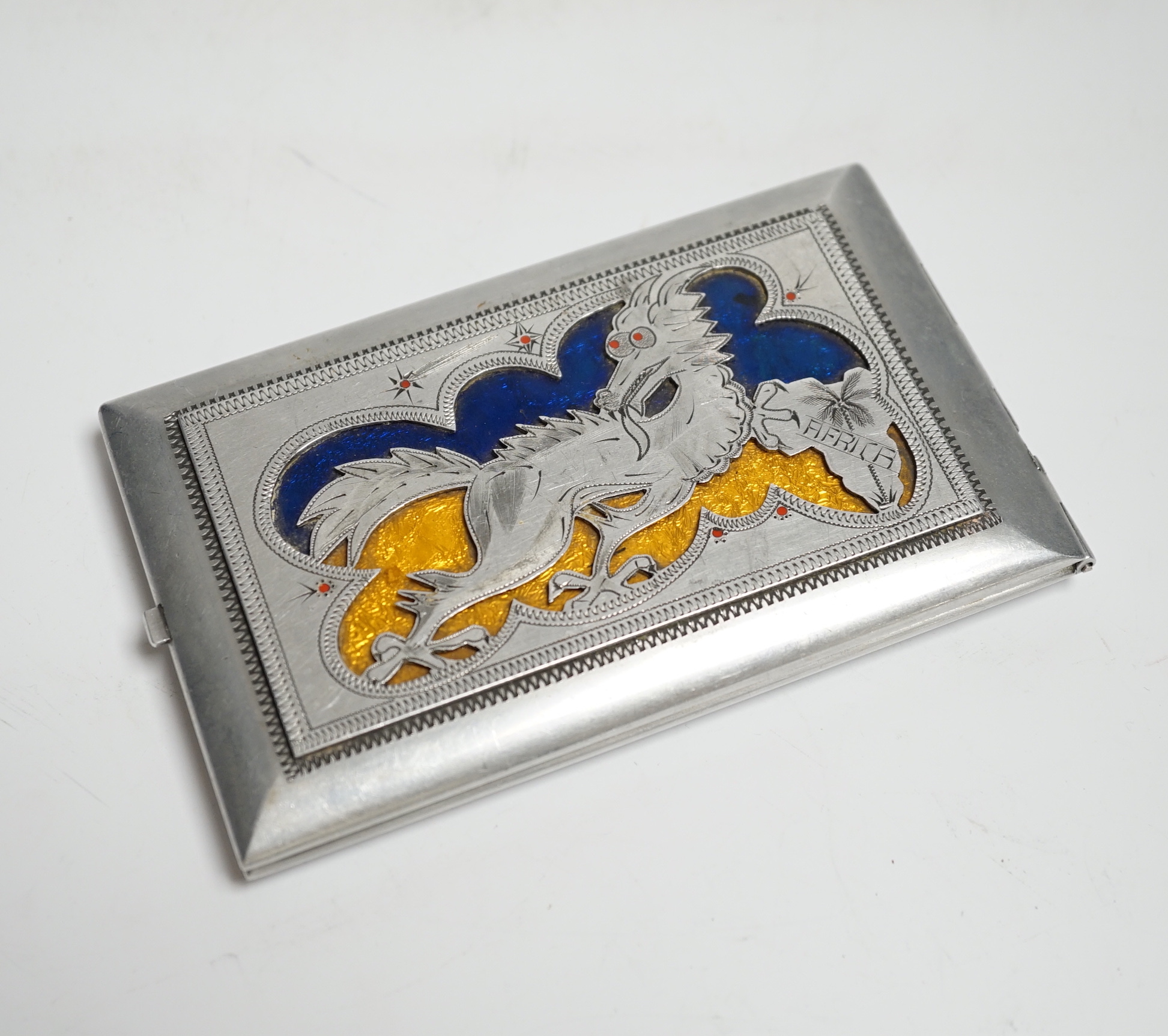 A novelty aluminium and enamel cigarette case made from a propeller, inscribed ‘Fred, Dot, Eddie, Maggie, Egypt 1947’, 13cm x 8.5 cm